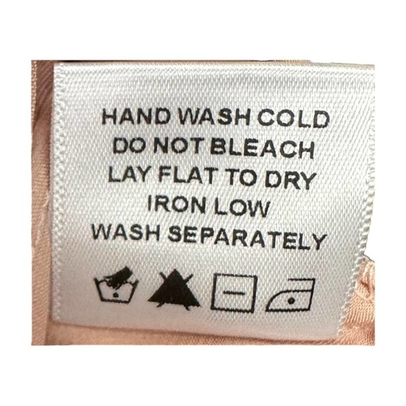 Revolve Majorelle Bexley Satin Ruffle Hem Drawstring Shorts in Blush Pink - Picture 6 of 6